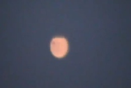 Orange orbs and triangle lights reported in AZ