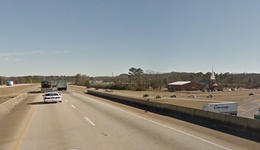 Low flying triangle UFO reported over busy Alabama highway